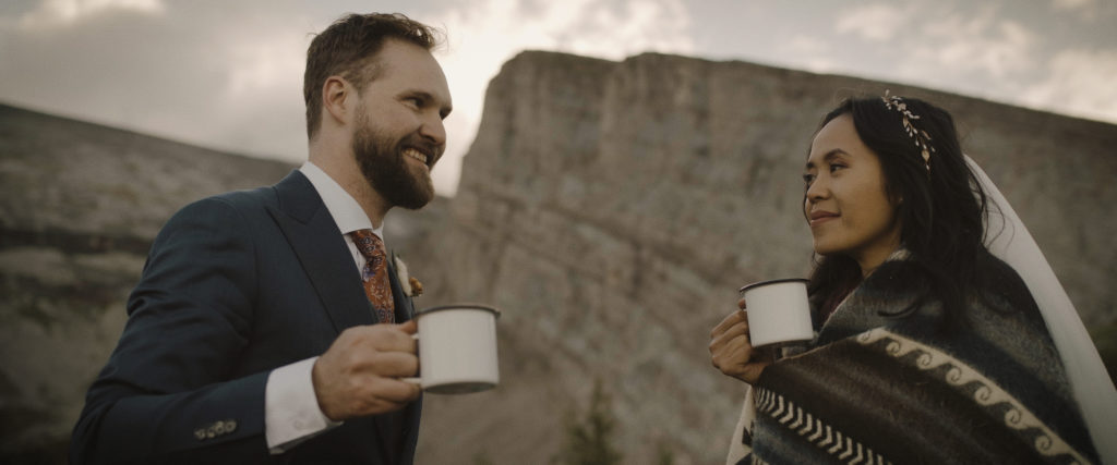 Enjoying coffee on a mountain summit in kananaskis alberta